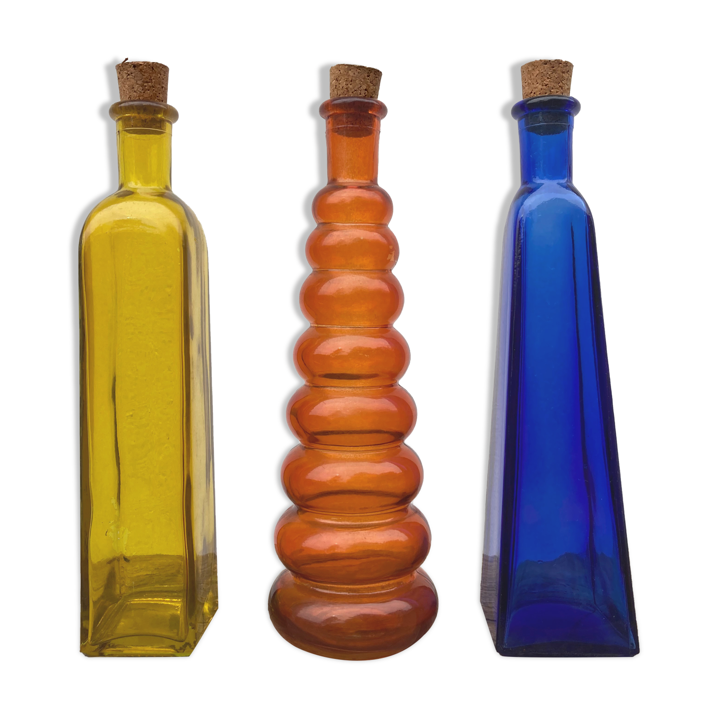 Trio of bottles 1970 color orange yellow and blue geometric shape