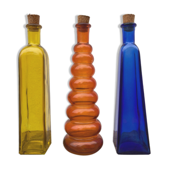 Trio of bottles 1970 color orange yellow and blue geometric shape