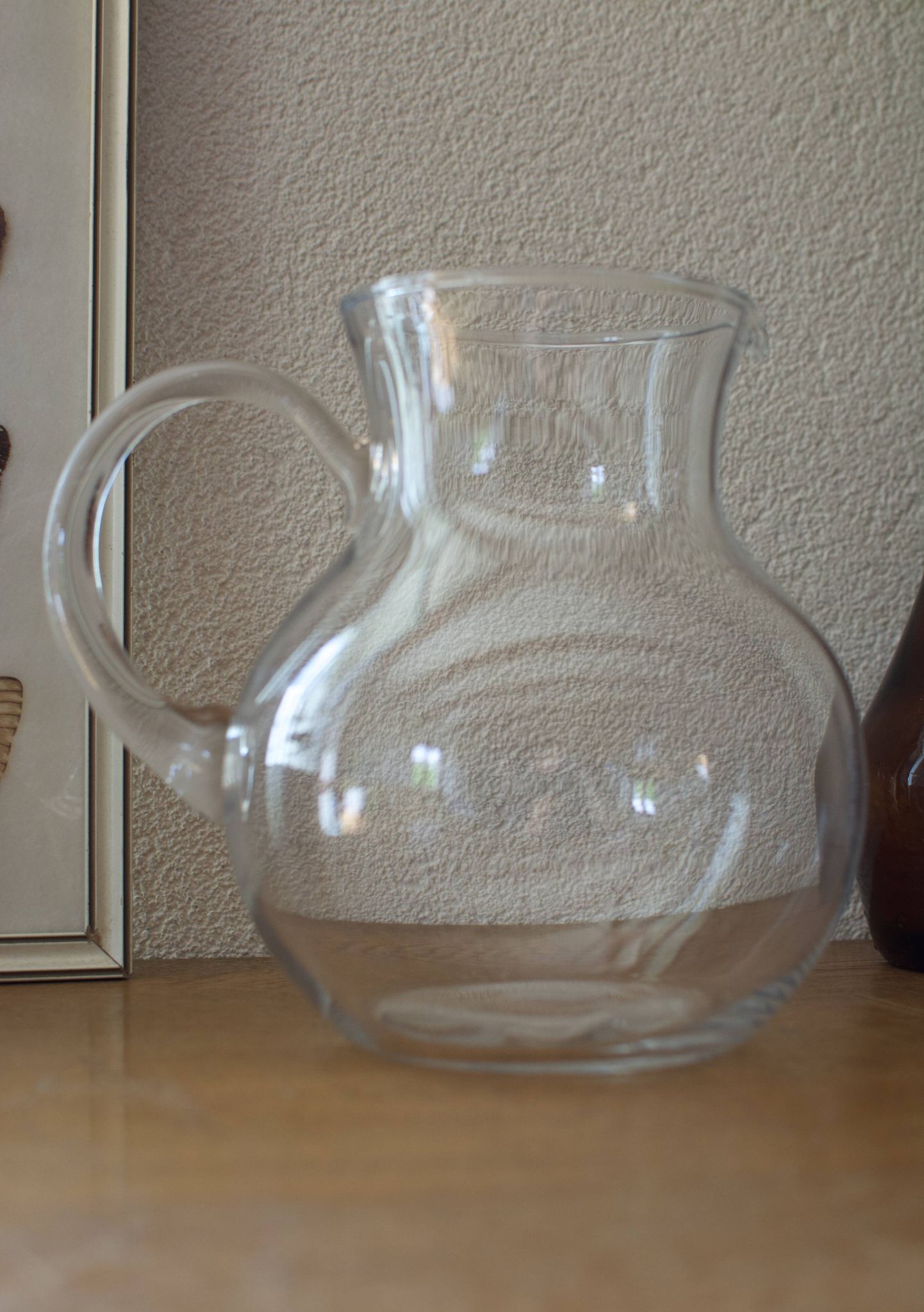 Pair of Orangeade pitcher in blown glass