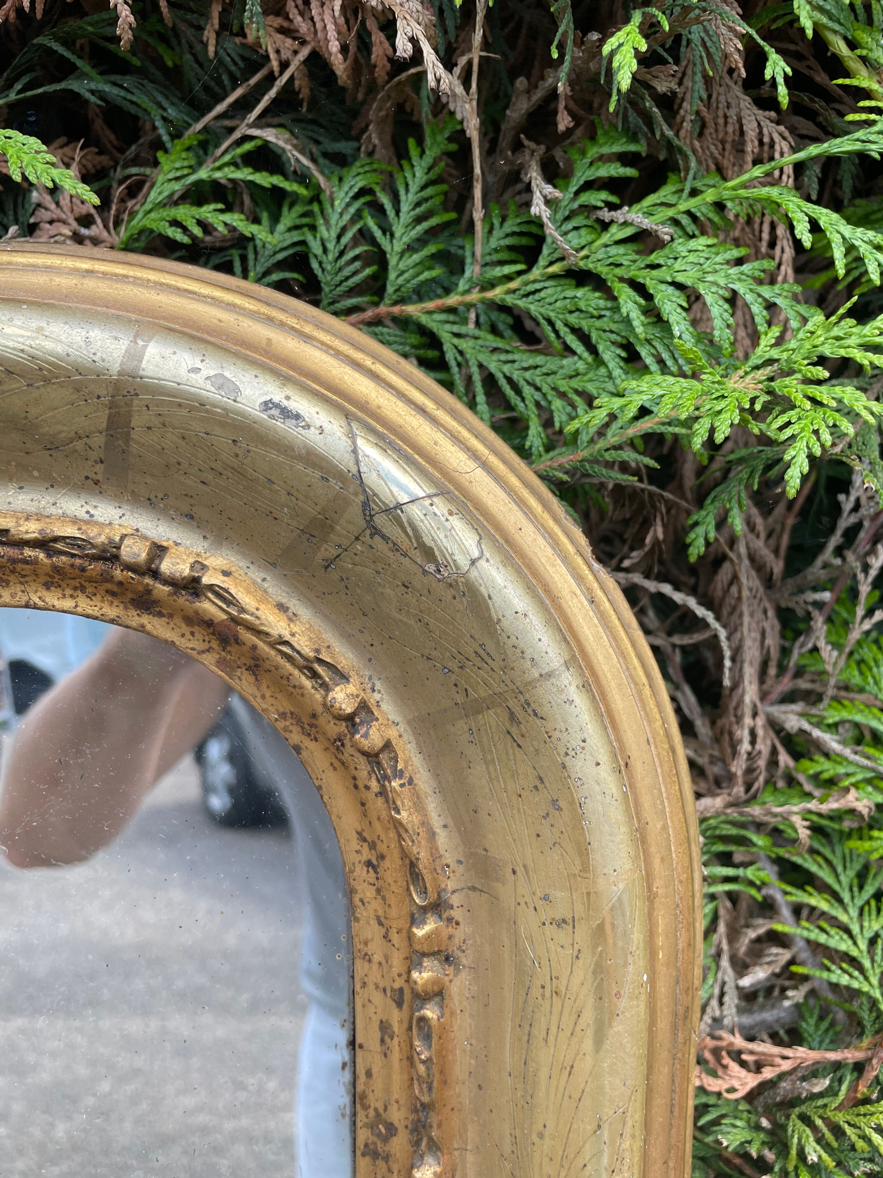 Louis Philippe period mirror with 19th gold leaf
