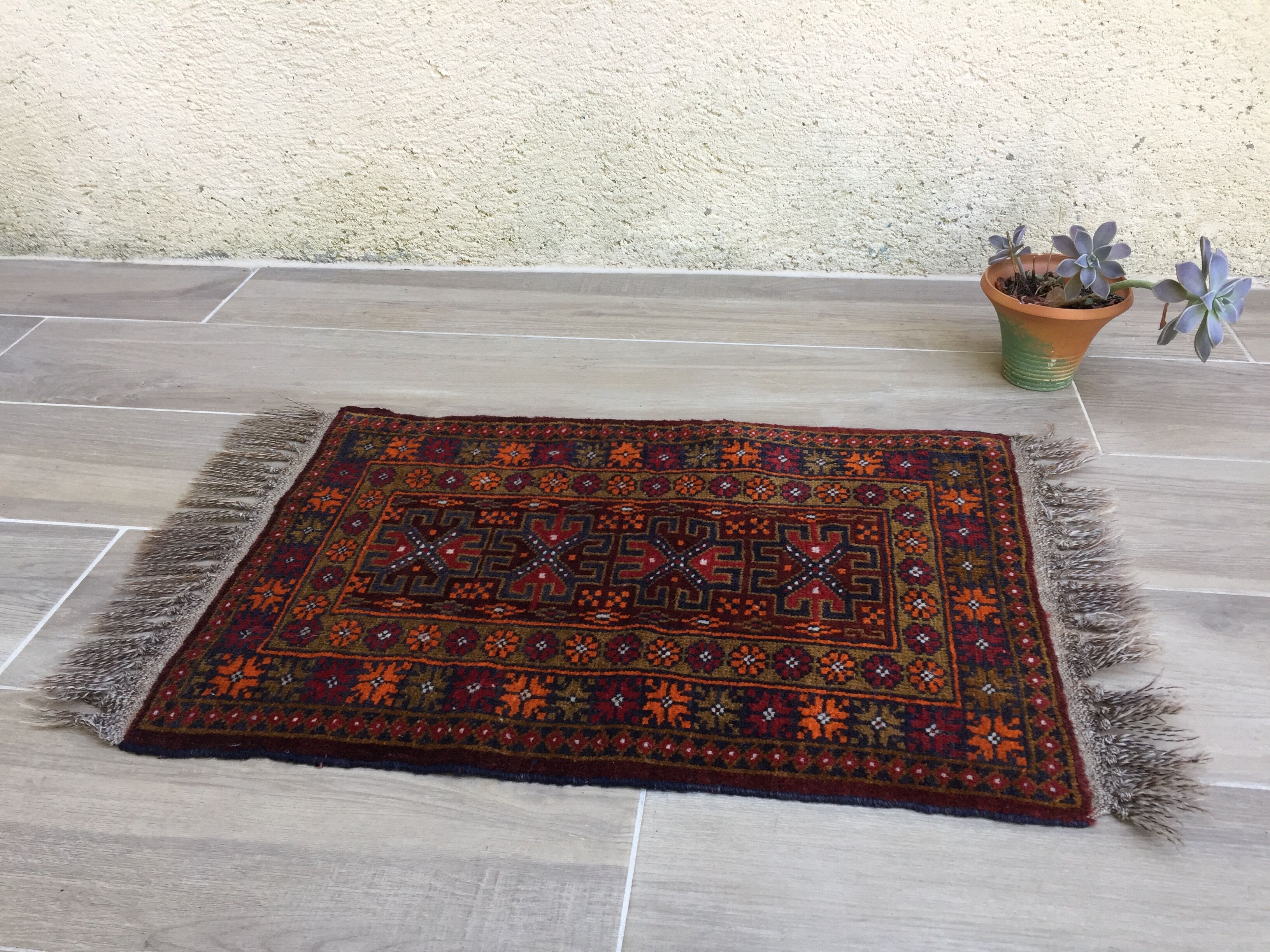 Small oriental wool rug - 80 x 46cm
