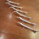Six silver metal knife holders basset hound