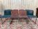 Set of 8 chairs – 1970s – Stainless steel sled base