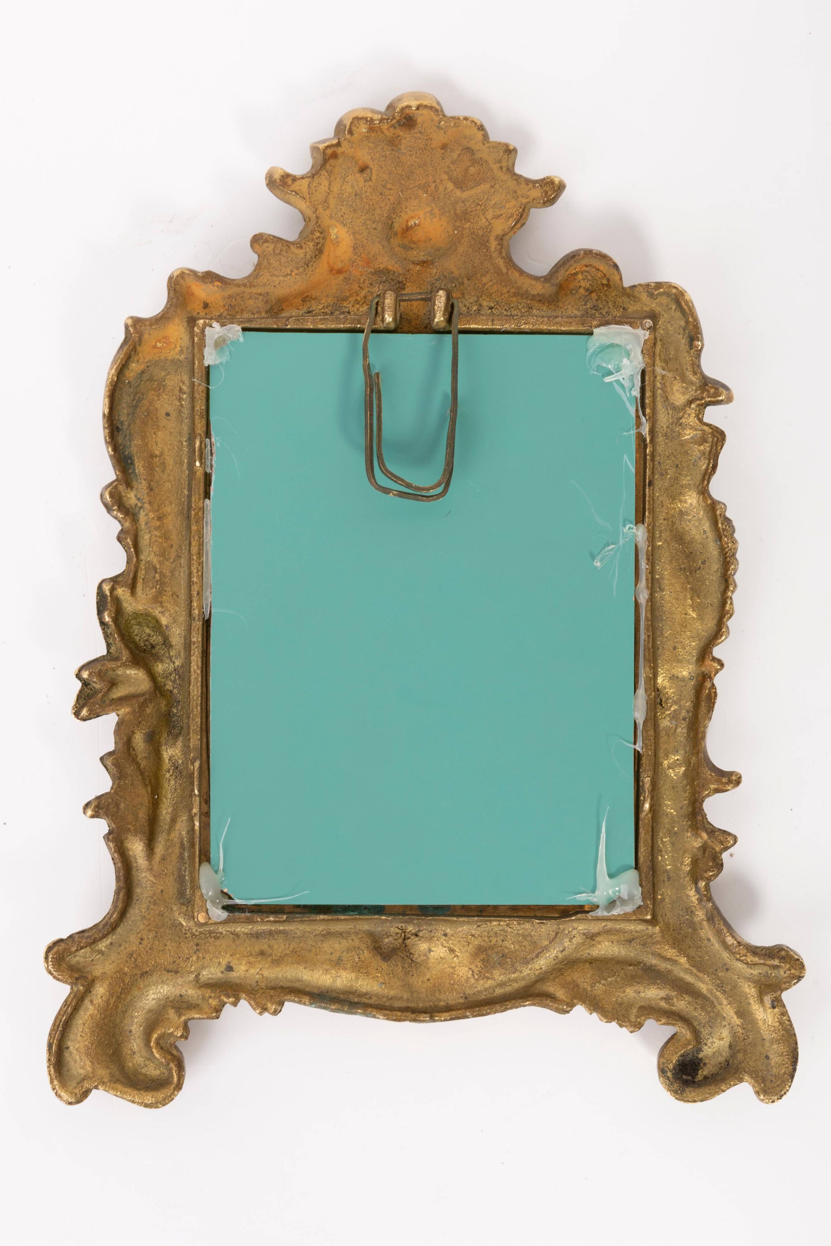 Miniature vintage gold mirror with angels, Italy, 1960s