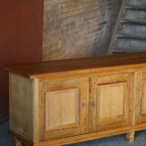 Modern Danish low enfilade in oak with panelled doors, mid-20th century.