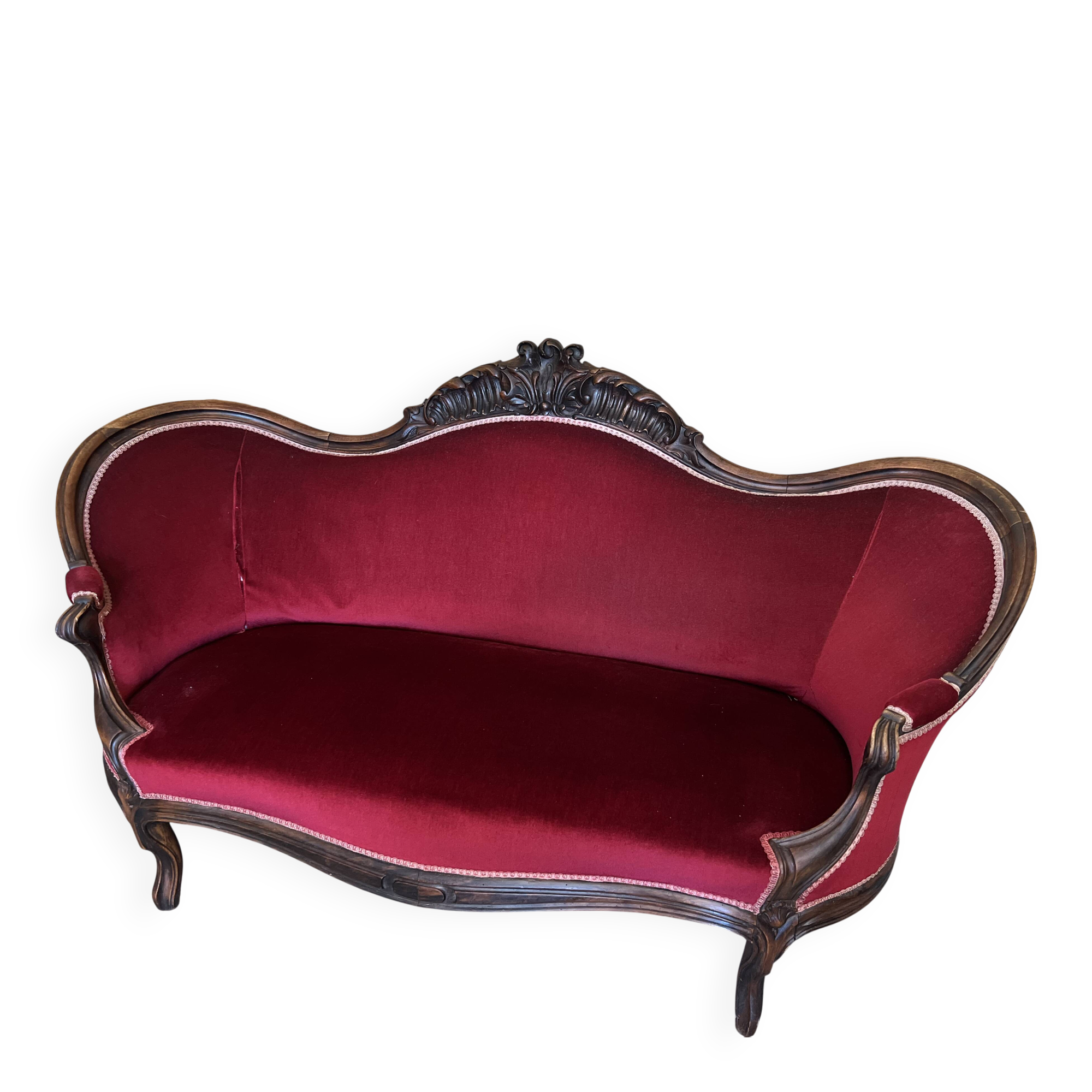 Antique canapé in wood and burgundy velvet in Louis Philippe style.