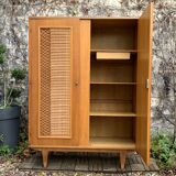 Rattan wardrobe and its compass-legged chest of drawers, 1960