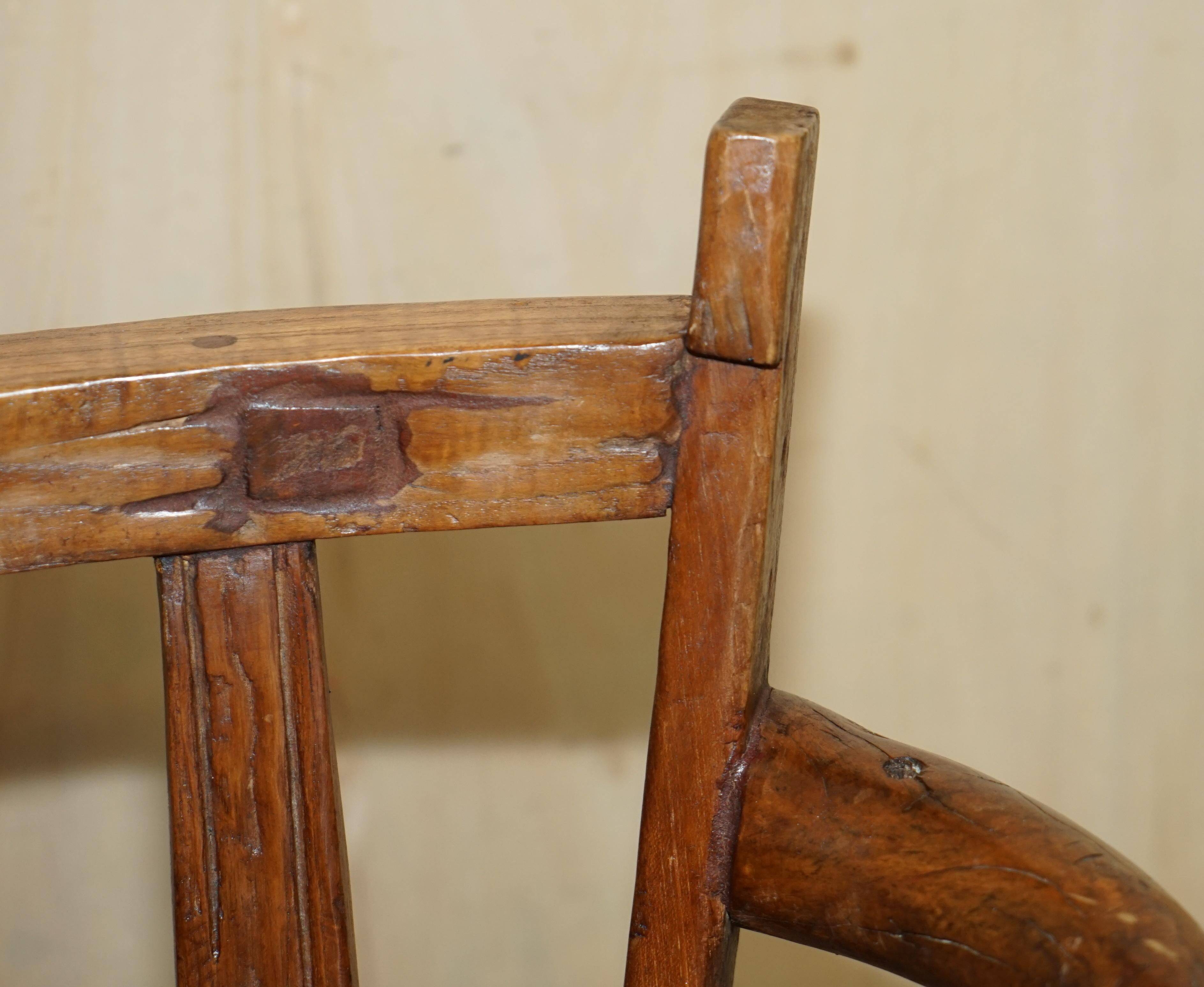 Antique captain's swivel chair on a draft horse wheel from around 1760.