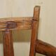 Antique captain's swivel chair on a draft horse wheel from around 1760.