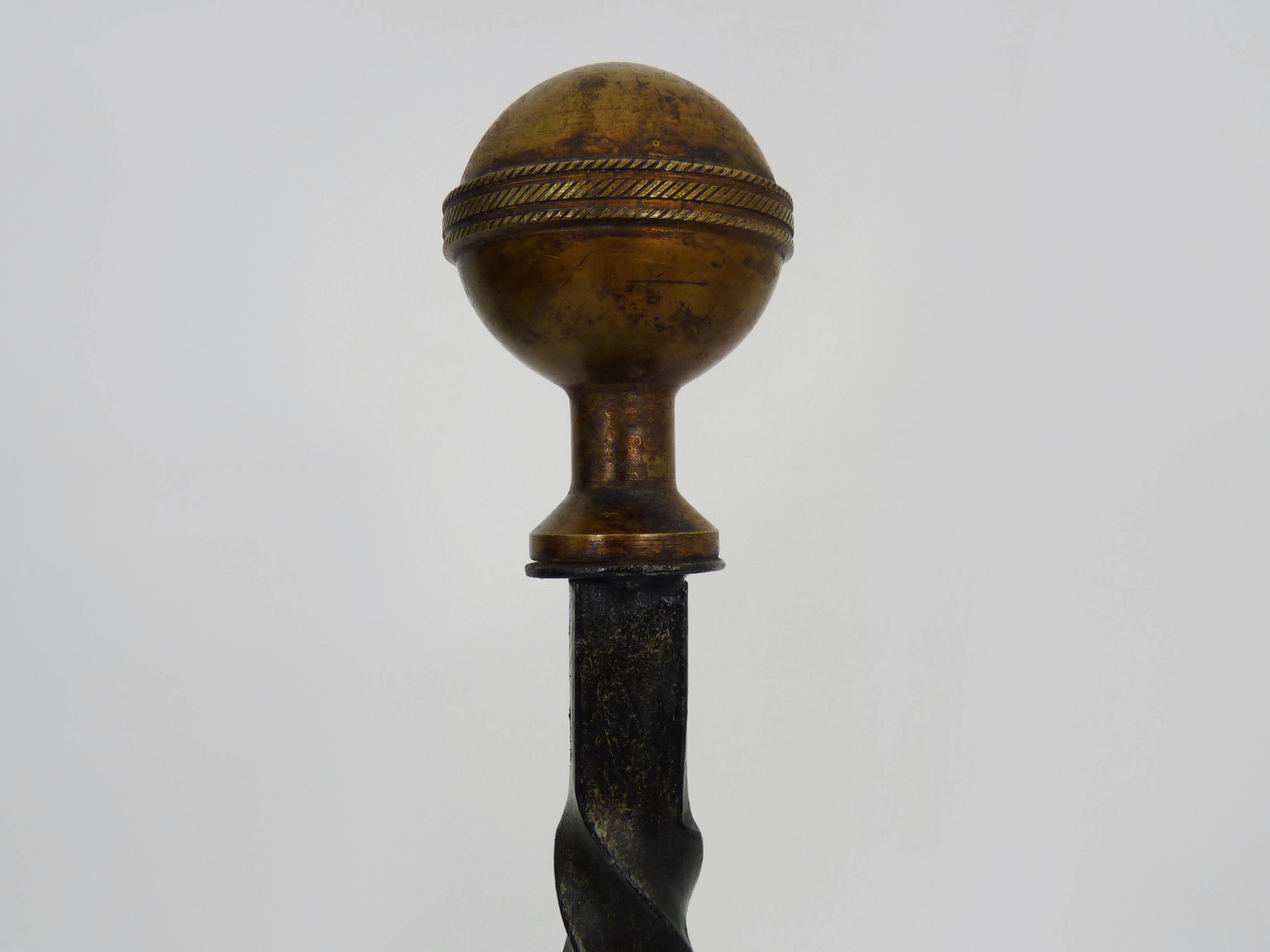 Large pair of wrought iron and brass ball fireplace andirons. 19th century