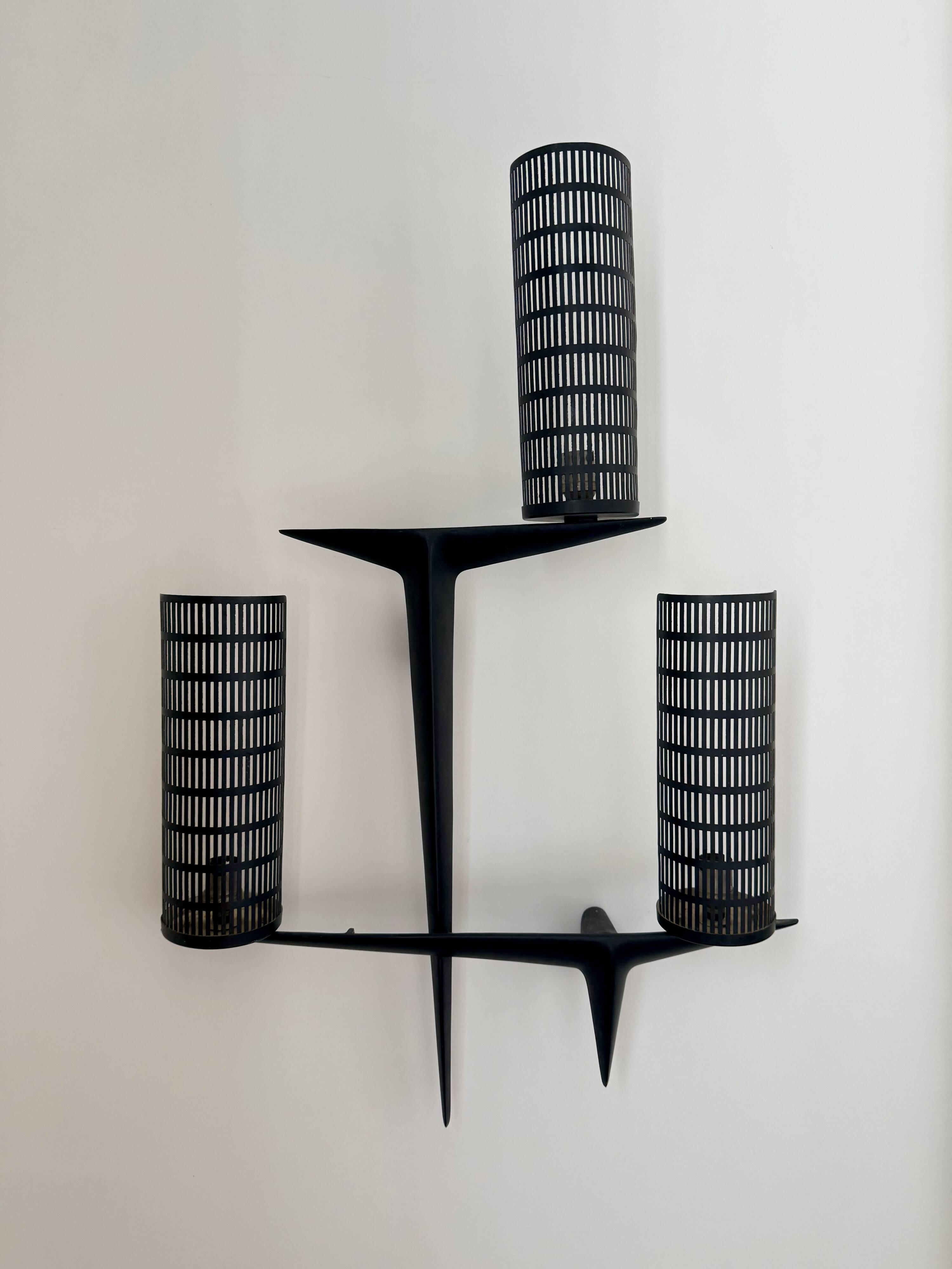 Pair of sculpted lacquered bronze wall lights, Arlus