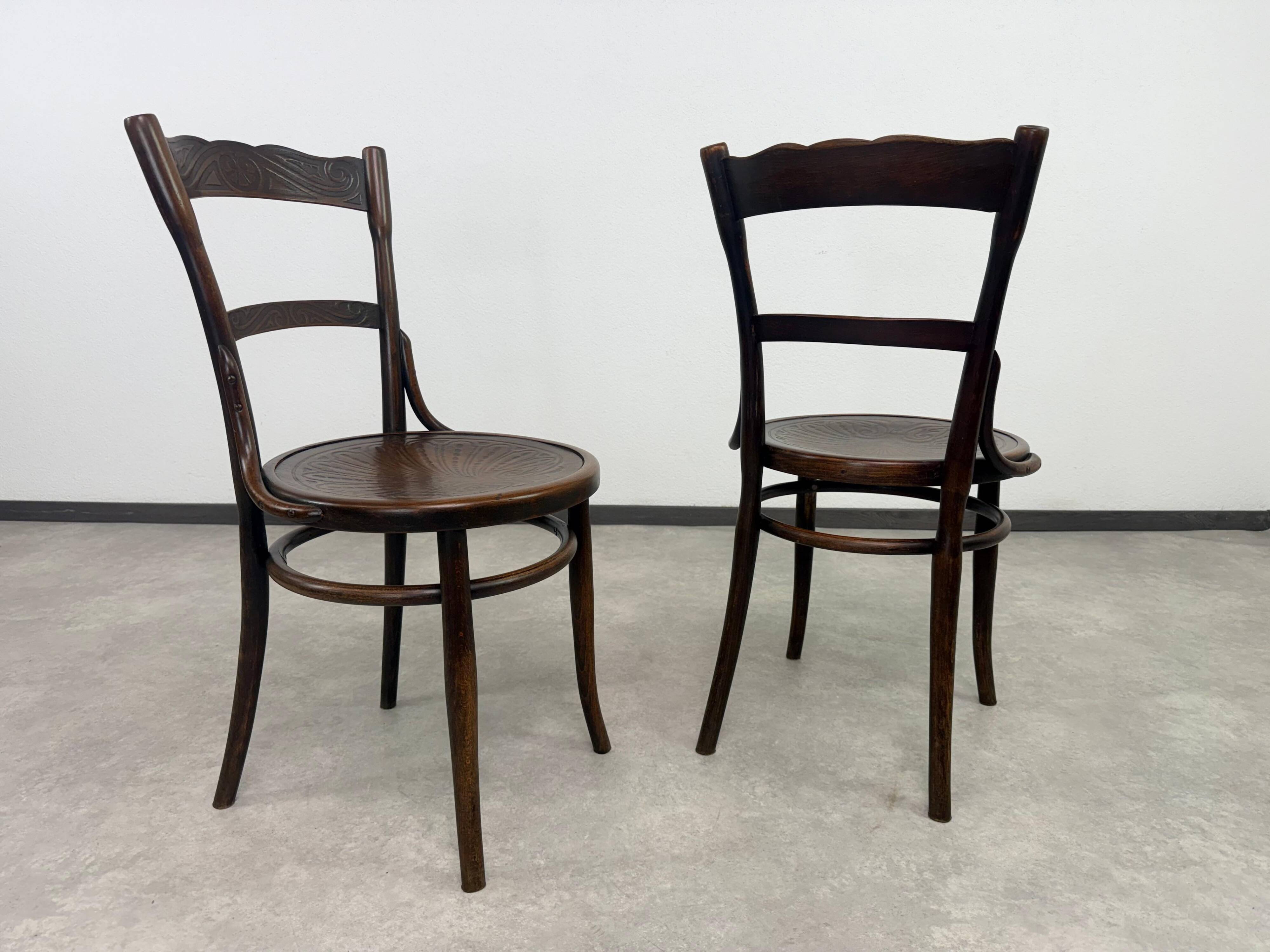 Set of 2 dining chairs by J&J Kohn