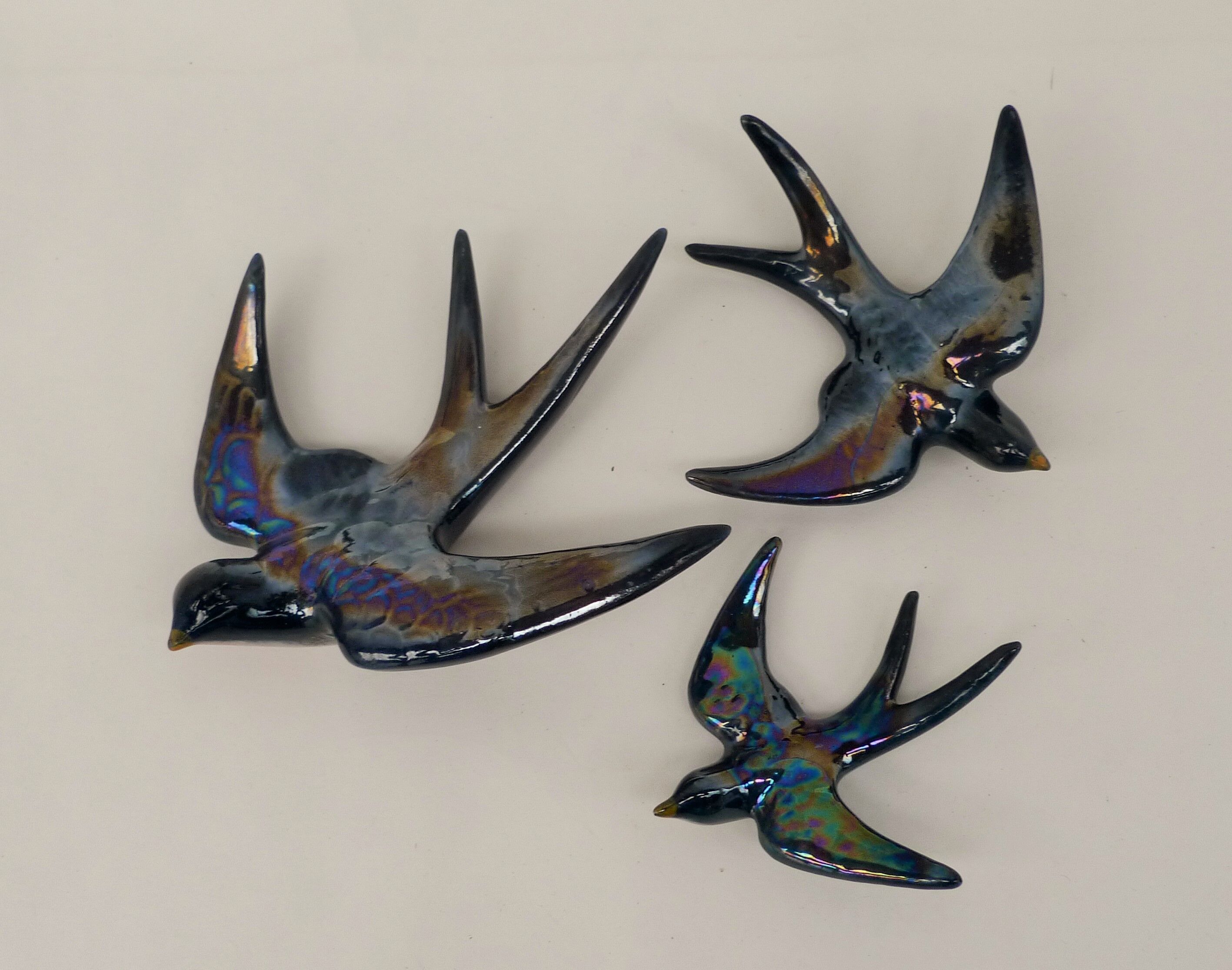3 iridescent ceramic swallows