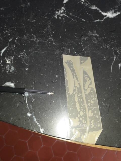 Old black marble chest of drawers