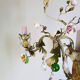 Painted metal chandelier and porcelain flowers