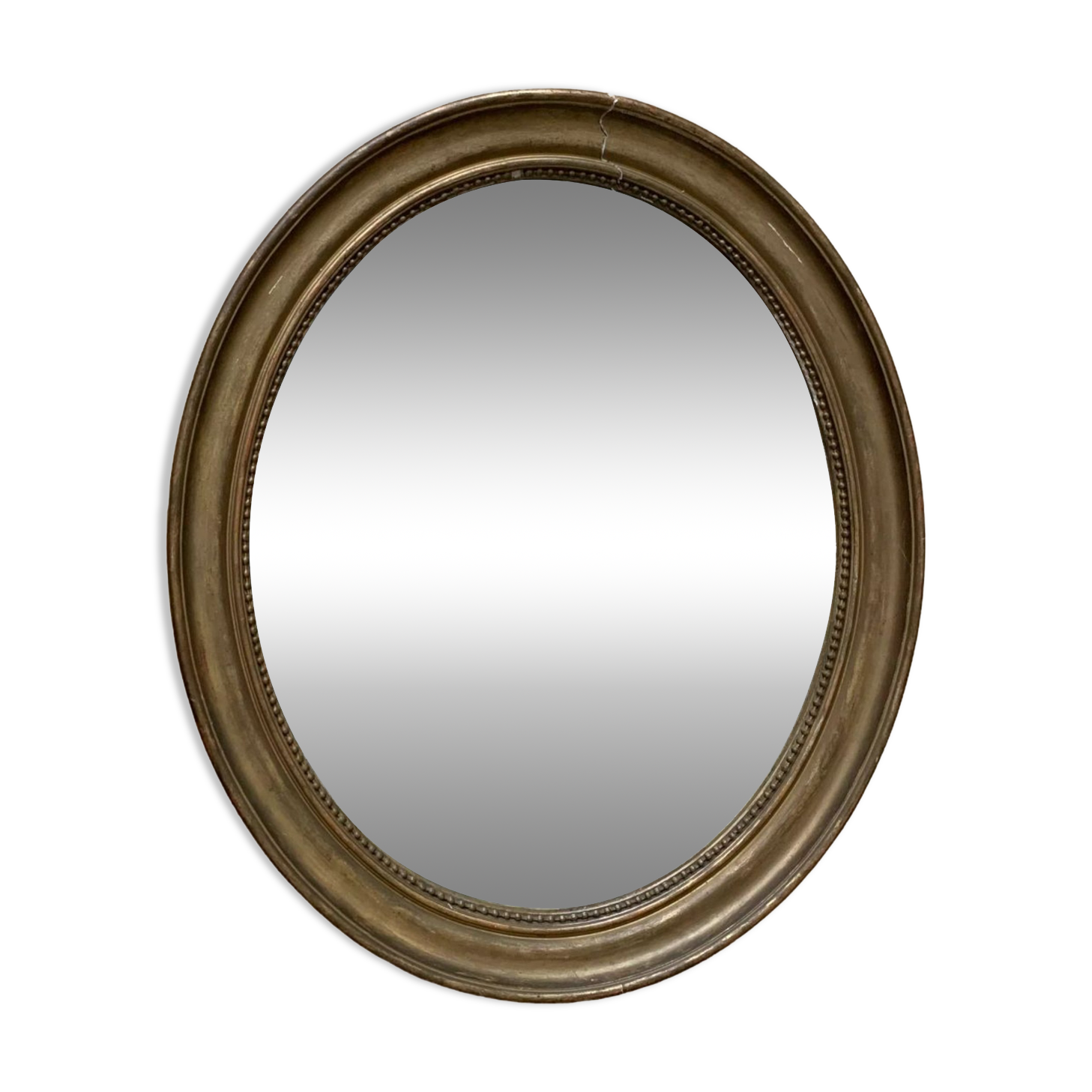 Old oval golden mirror