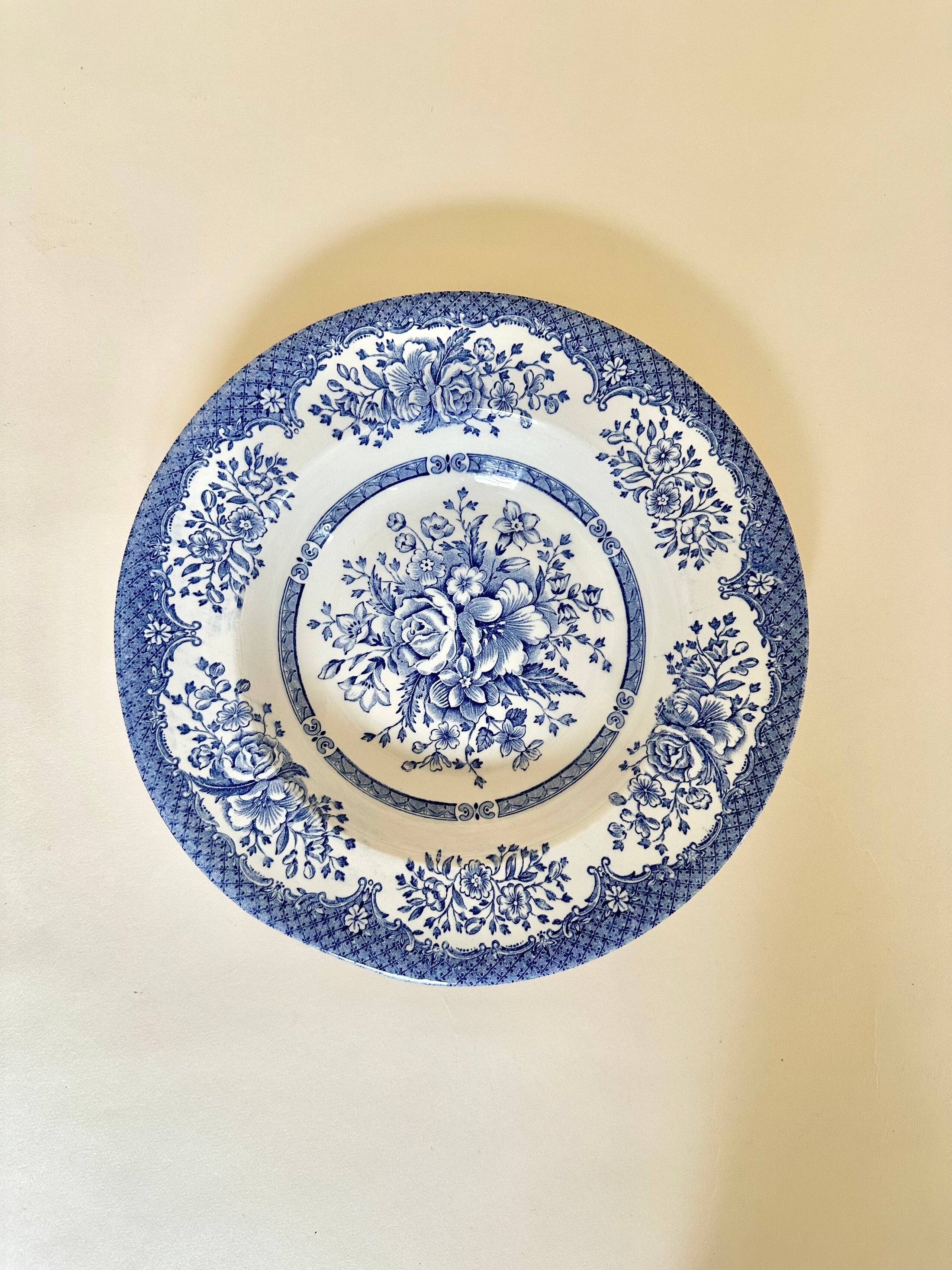 Set of six English deep plates, made of ironstone ceramic, floral patterns.