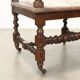 Antique Neo-Renaissance armchair in oak and fabric, 19th-20th century.