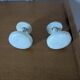 Two vintage coat hooks