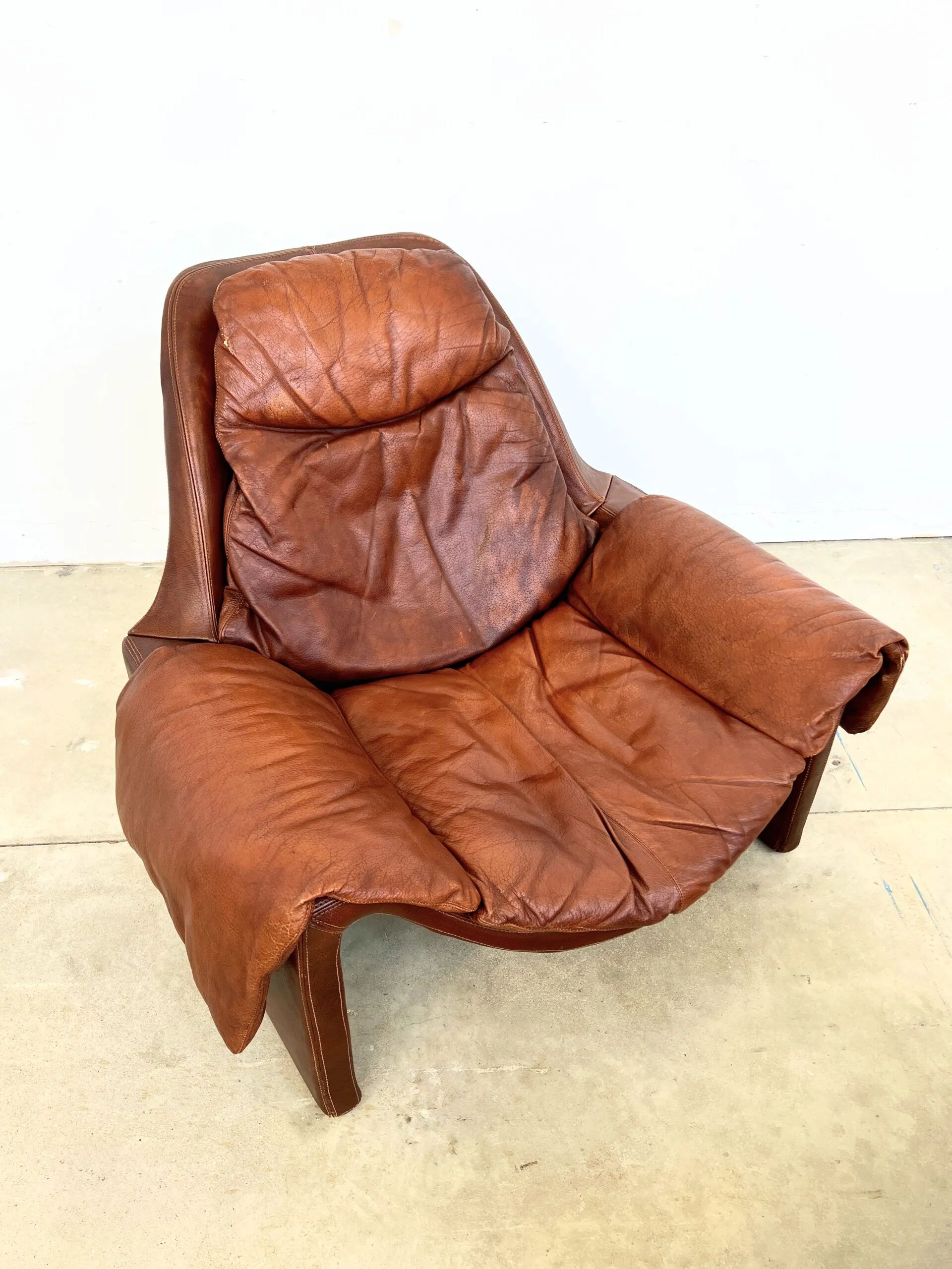 Havana leather armchair and ottoman P60