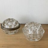 Pique flowers in metal circled glass