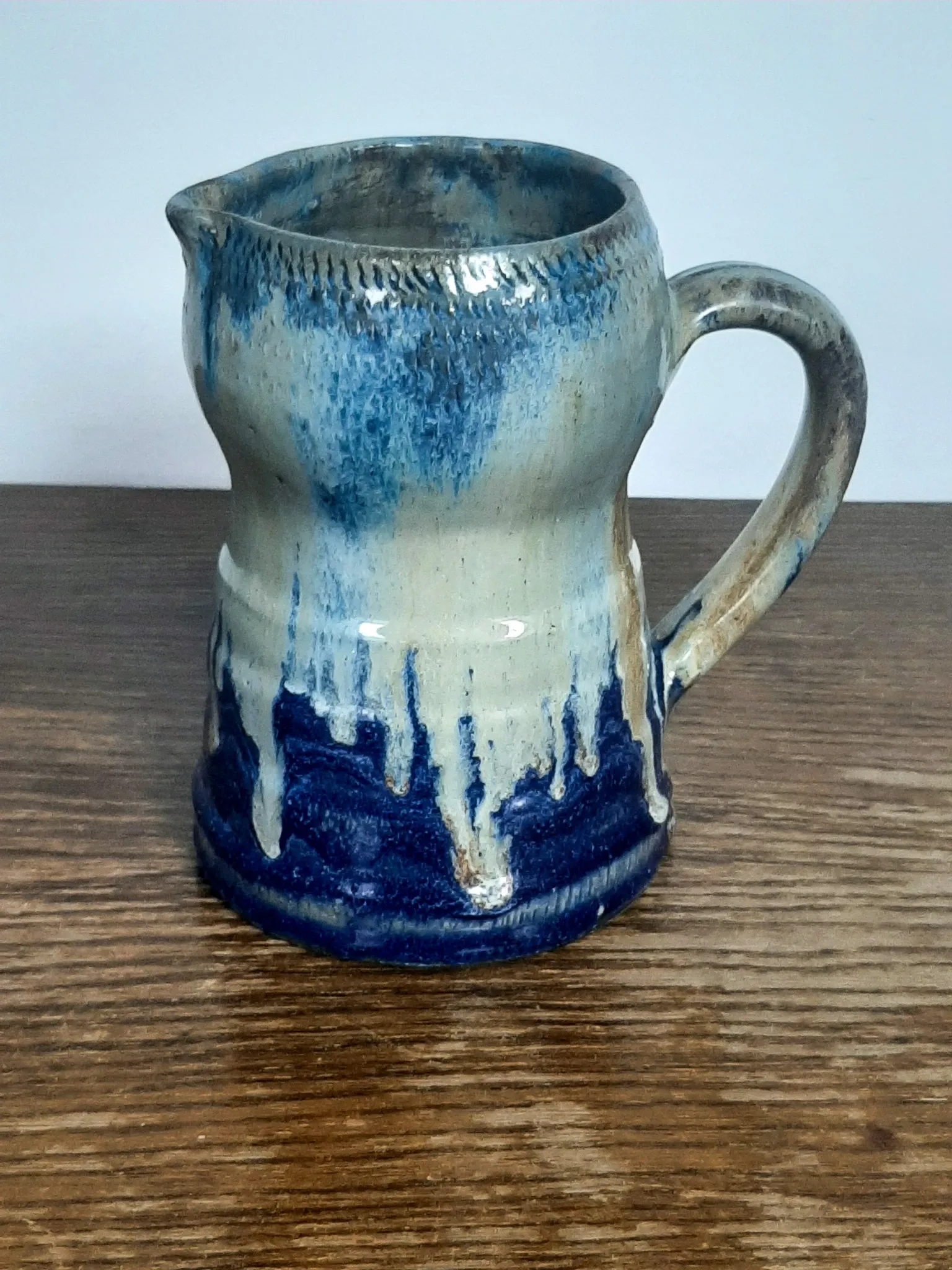 Blue flamed stoneware jug