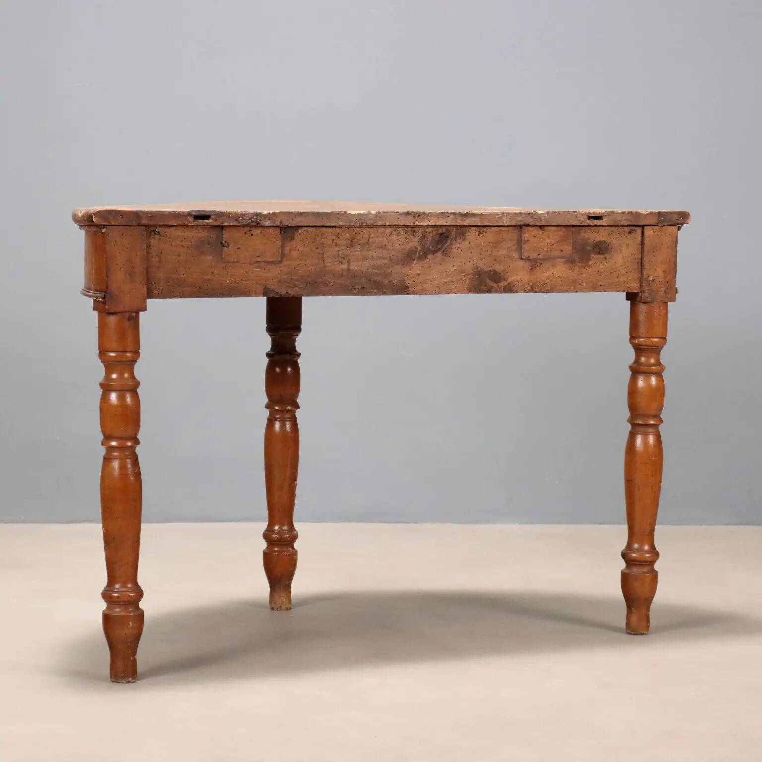 Antique walnut console with a half-moon top, Italy, 19th century.