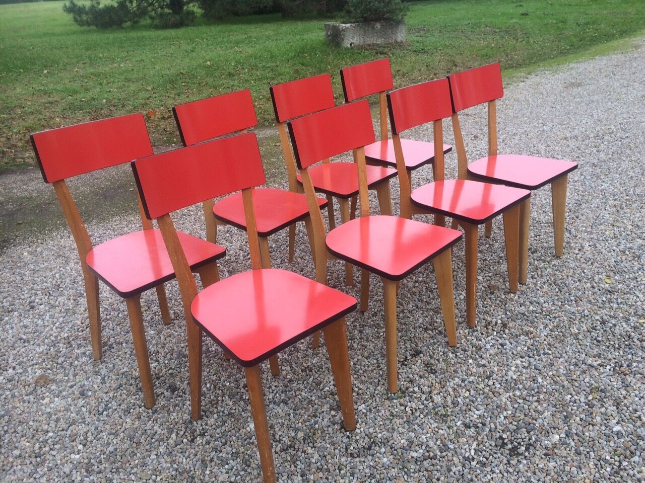Eight wooden and formica chairs