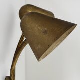 Double orientable vintage patinated brass wall light, Jacques Biny France 1950.