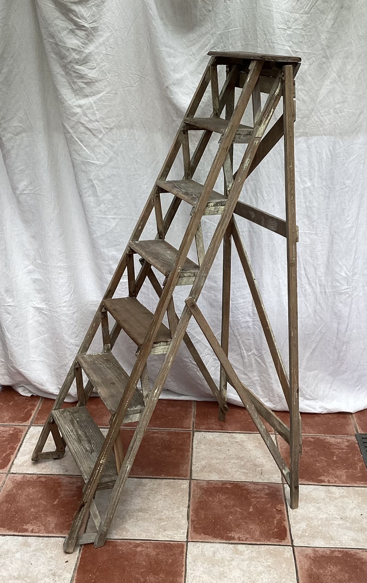 Wooden painter's stepladder in the middle of XX century foldable
