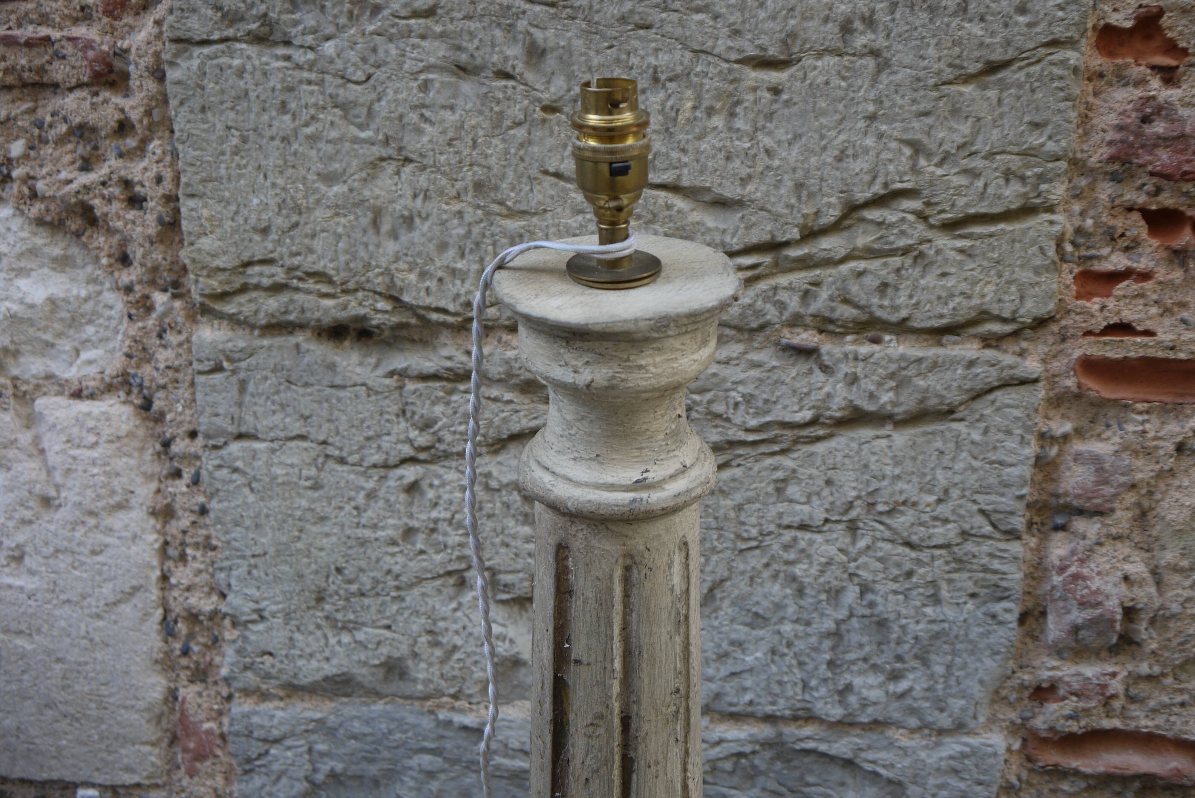 Baluster lamp foot in patinated wood