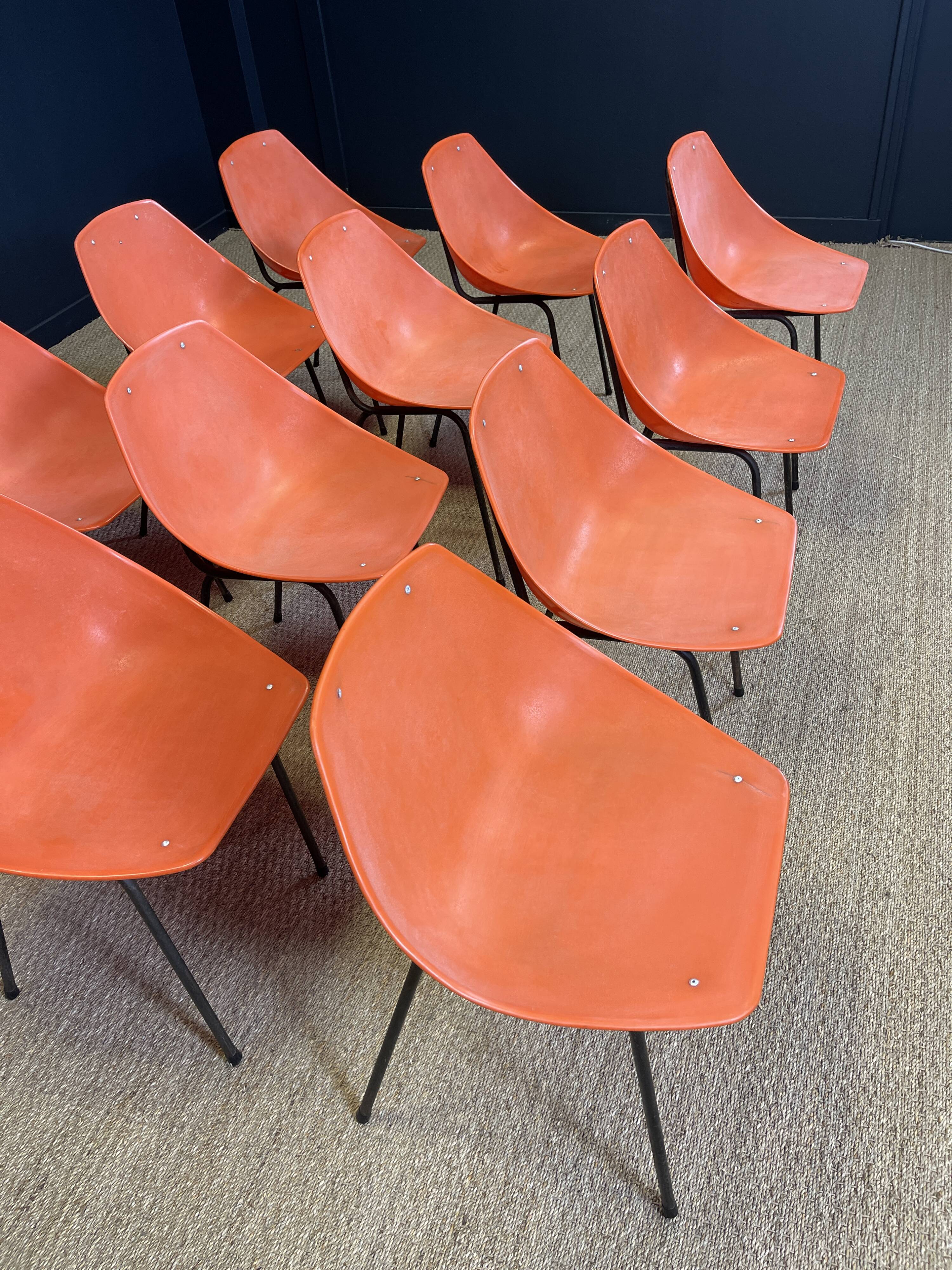 Set of 12 orange Guariche chairs