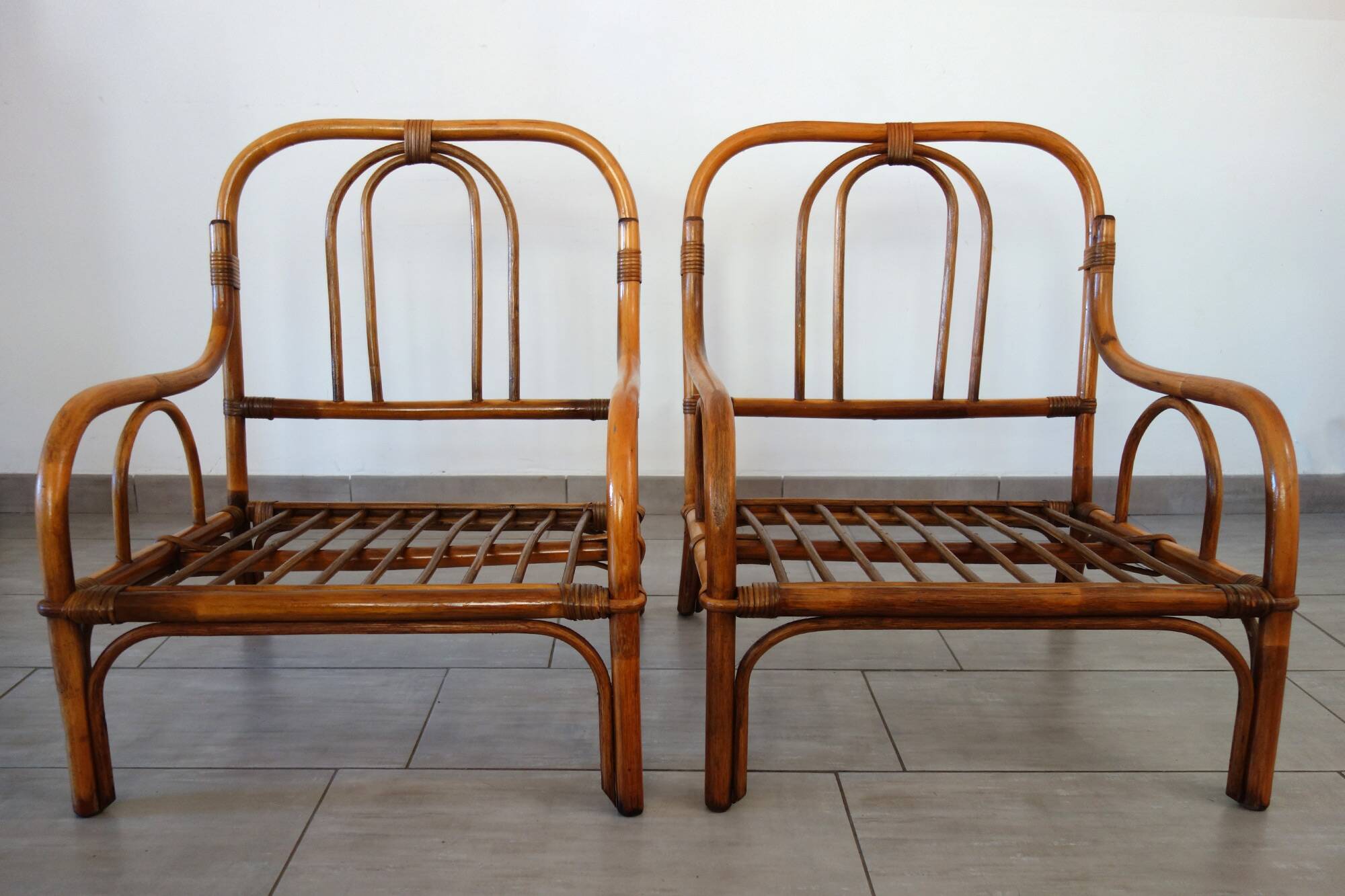 Pair of vintage low armchairs in bamboo and rattan