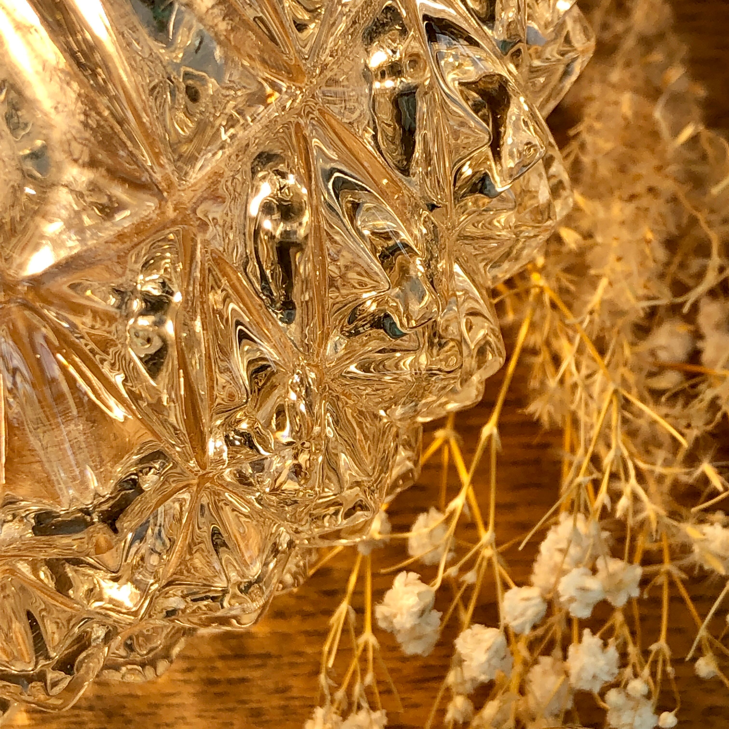 Vintage globe stroller in moulded glass