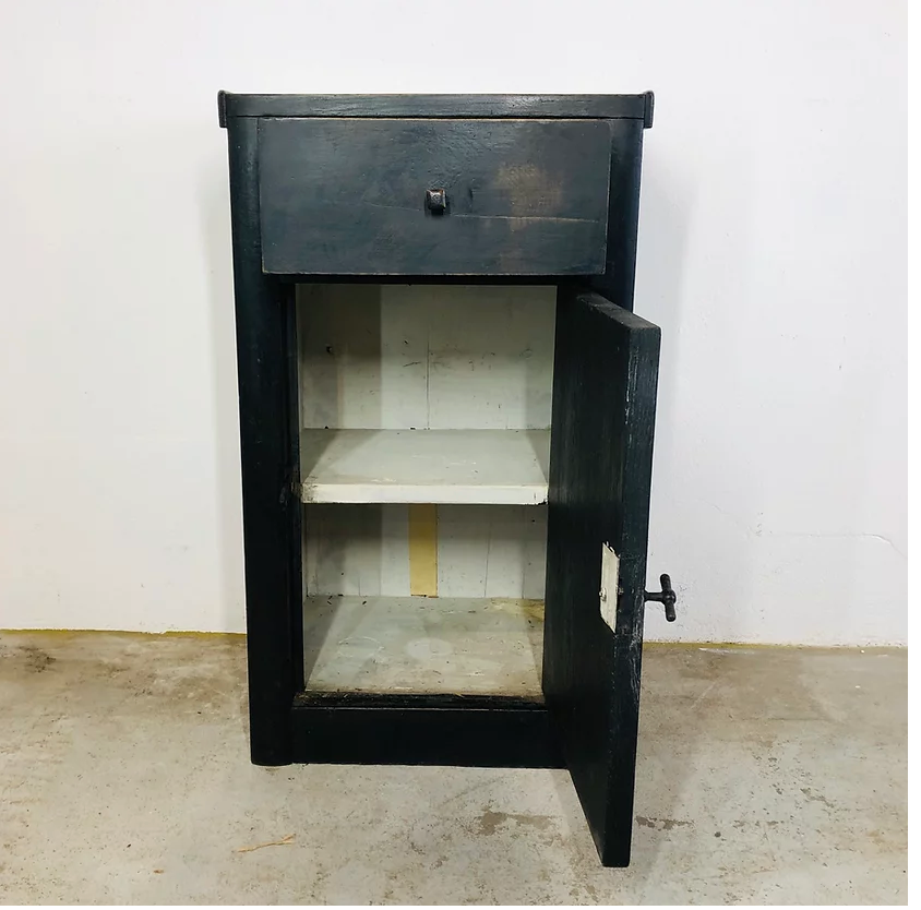 Antique black patinated bedside table