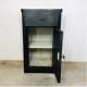 Antique black patinated bedside table
