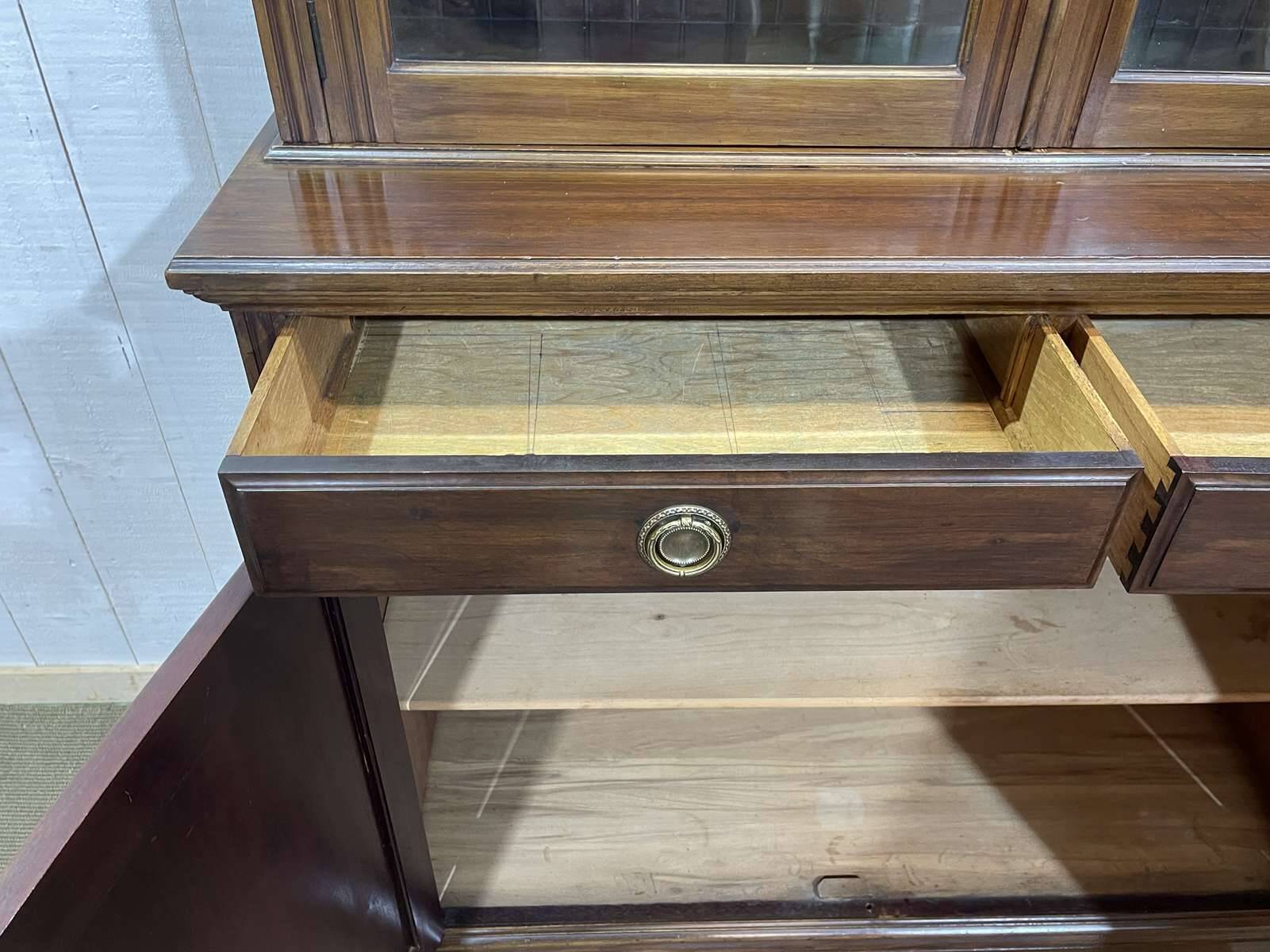 English walnut two-body library from the early 20th century.
