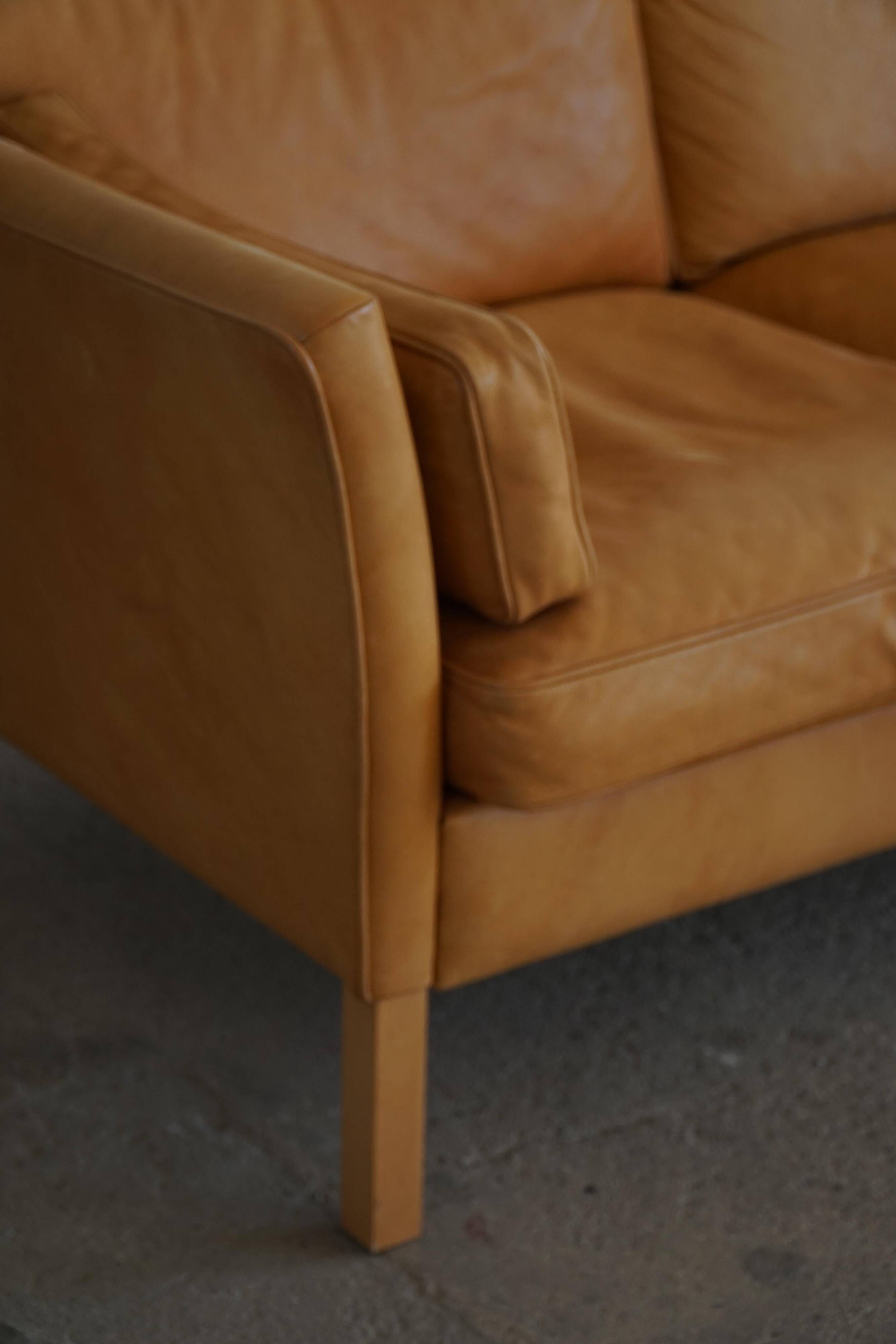 Danish Midcentury 3-seater canapé by Stouby in cognac brown leather, made in the 1970s.