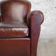Club chair with floral backrest