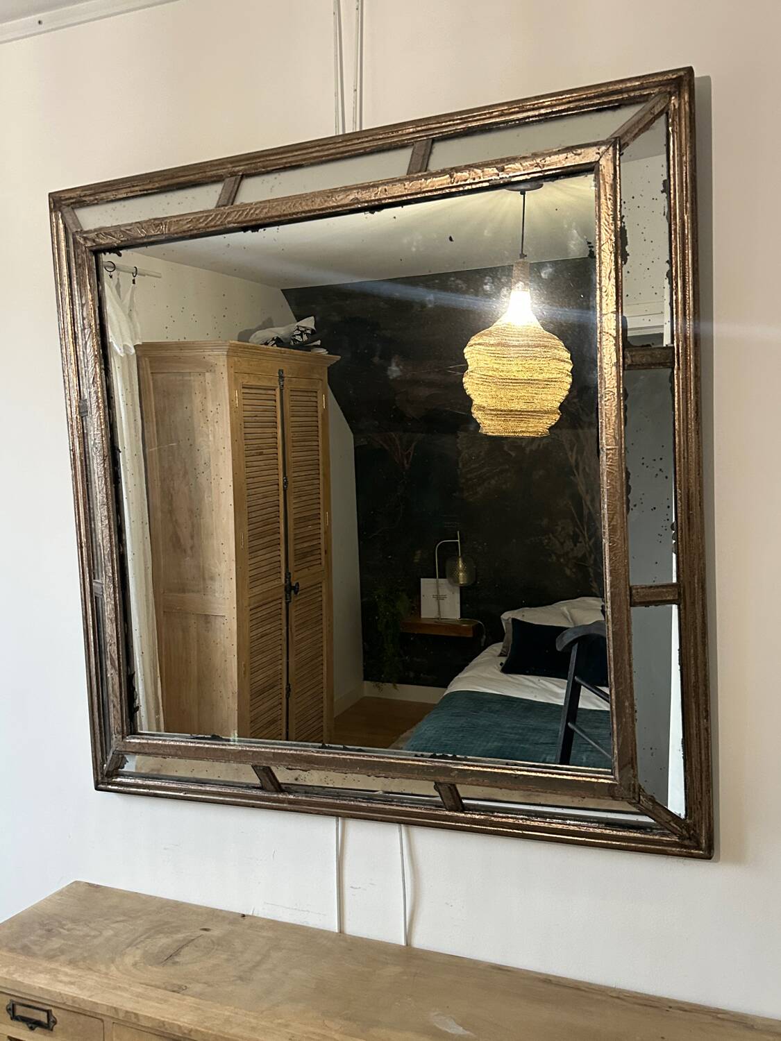 Antique mirror with wooden ornaments