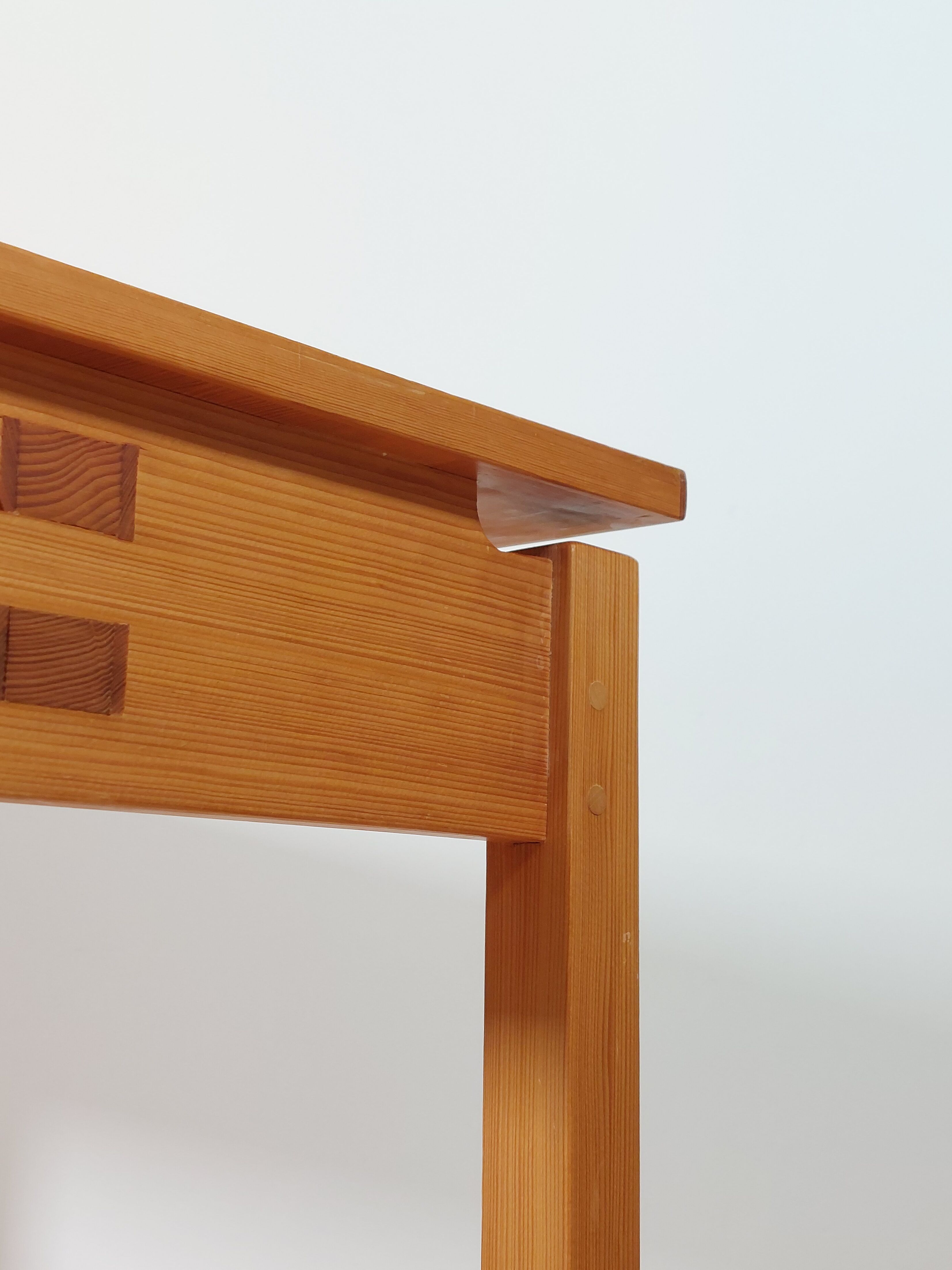 Meticulously crafted vintage pine side table, a masterpiece.