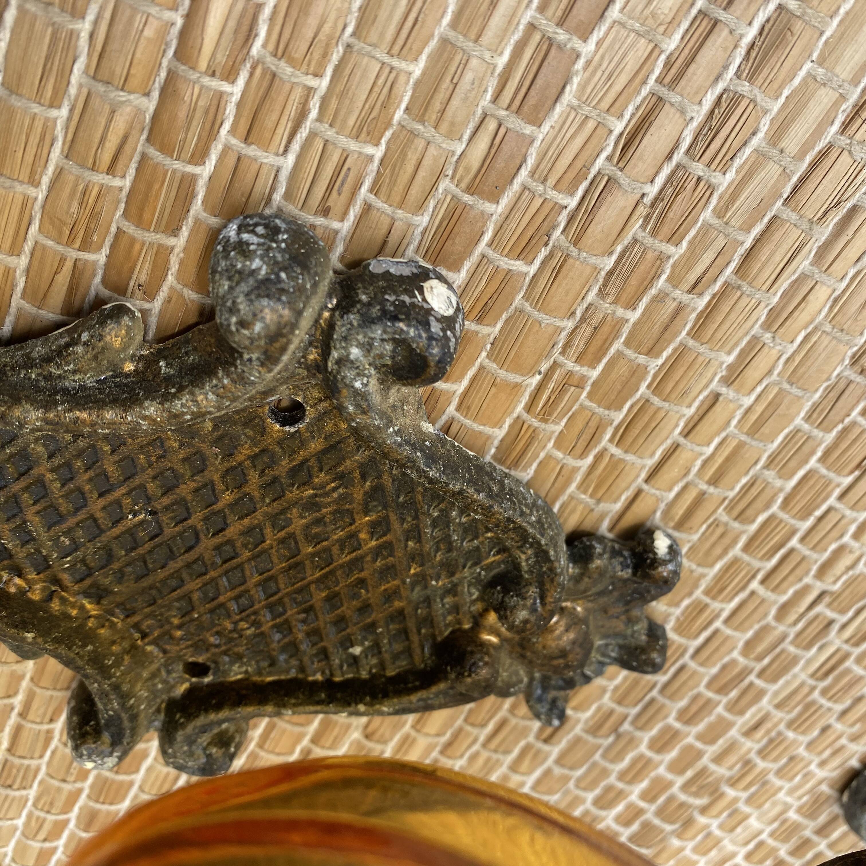 Medieval style metal and amber glass wall lamp