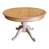 Round cherry table with 2 extensions.