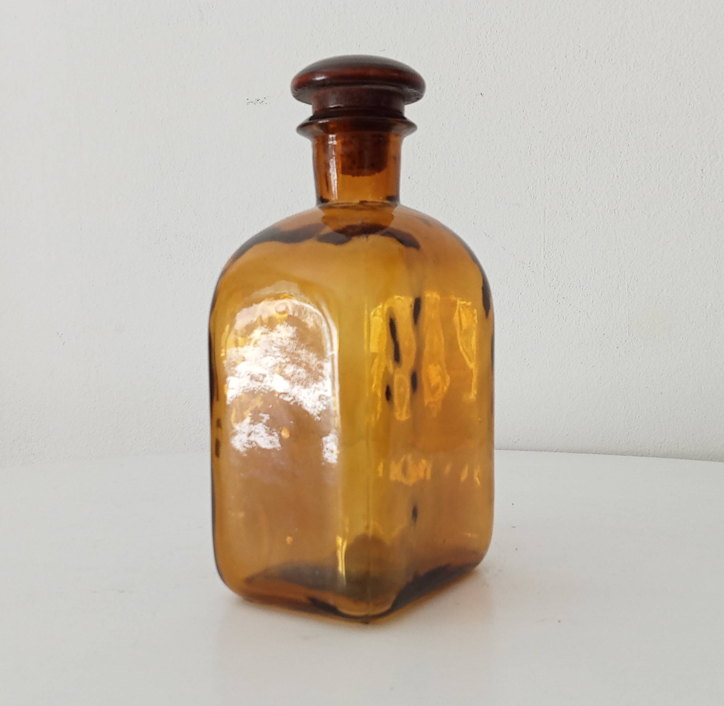 Vintage amber glass apothecary bottle