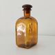 Vintage amber glass apothecary bottle