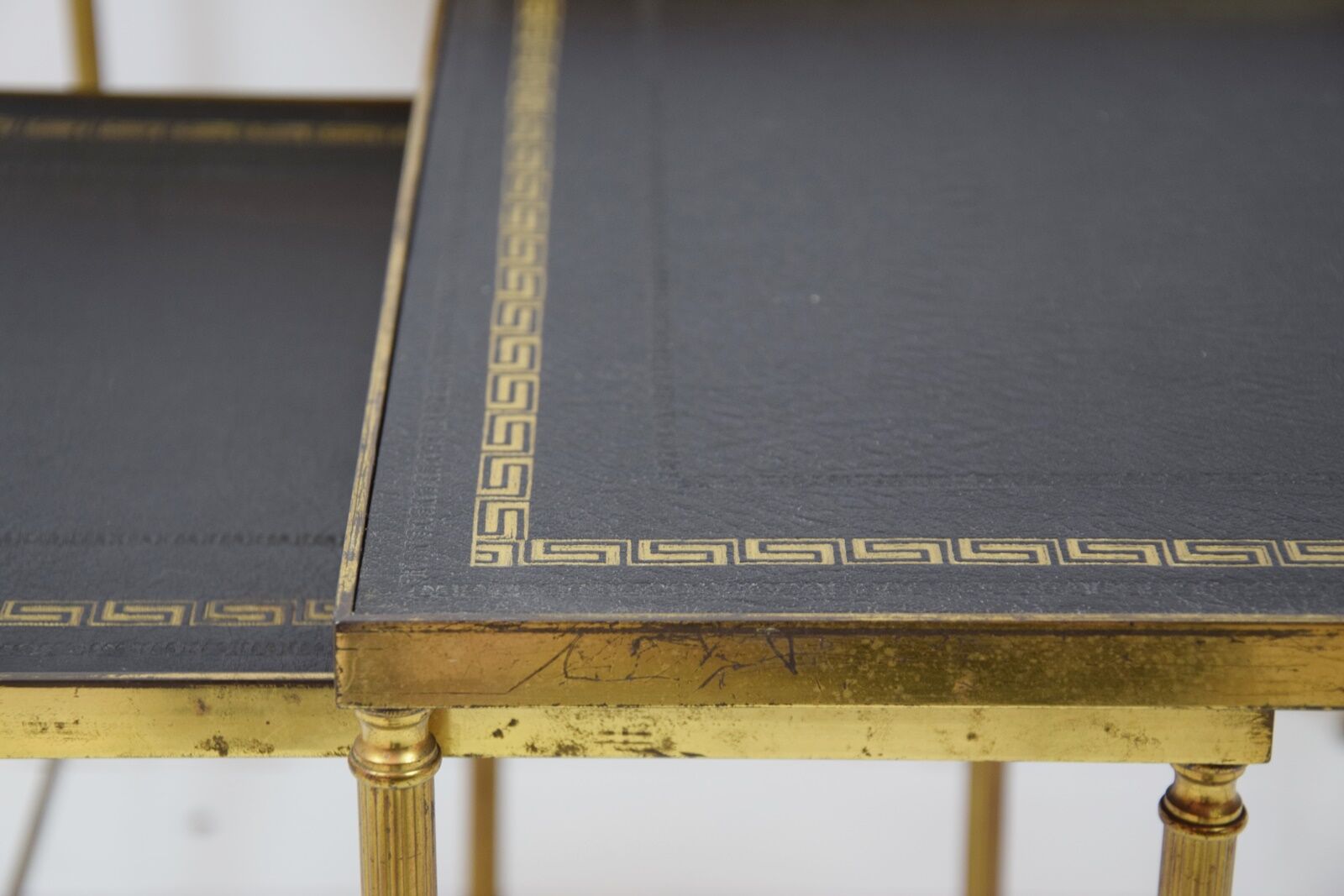Brass and skaï side tables, 1950s