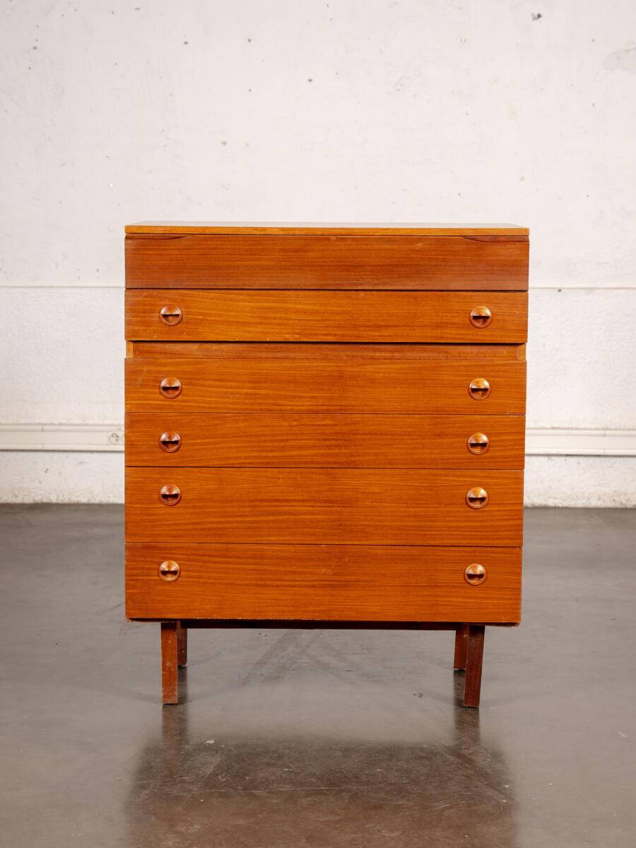 Large English teak chest of drawers