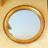 Round golden mirror