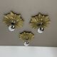 Ensemble de trois appliques murales en bronze sunburst brutalistes, Italie années 1950.