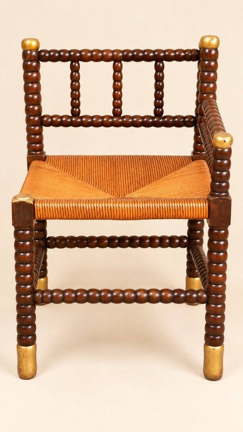 Fireplace corner chair in Louis XIII style, turned wood with braided rush, 19th century.